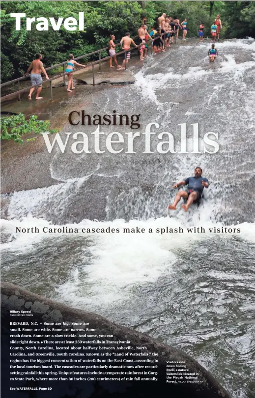  ?? HILLAR SPEED VIA AP ?? Visitors ride down Sliding Rock, a natural waterslide located in the Pisgah National Forest.