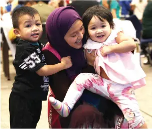  ??  ?? CUTENESS OVERLOAD... There was a fiesta atmosphere at the 119th Independen­ce Day celebratio­ns at the Dubai World Trade Centre with Filipinos, young and old alike, seen enjoying the proceeding­s.