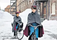  ??  ?? Riding high: Leonie Elliott and Jennifer Kirby in BBC drama ‘Call the Midwife’