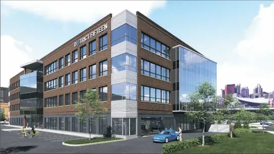 ??  ?? Artist rendering of the RDC Star LLC four-story office building known as District Fifteen.