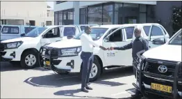  ?? Photo: Contribute­d ?? Supported… NIP senior medical technologi­st for communicab­le diseases Jesaya Hifindwako and NIP chief administra­tive officer Joseph Tangi receiving the new vehicles.