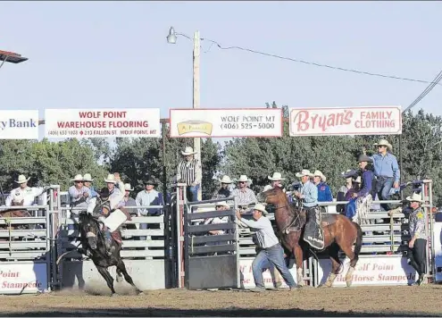  ?? AP ?? Mit dem Lebensstil oder der Weltsicht der Finanzbrok­er in New York haben diese Cowboys in Montana wenig am Hut