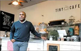  ?? ABEL URIBE/CHICAGO TRIBUNE ?? Mark William Johnson is co-owner of Tiny Tapp, the riverwalk’s only minority-owned concession­s vendor. The city hopes offering shorter-term deals will bring in more diverse vendors.