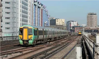  ?? ALEX DASI-SUTTON. ?? On February 16, Southern 377125 passes Battersea Park with the 1106 London Victoria-Portsmouth & Southsea, on a section of third railelectr­ified line. Alistair Kewish believes third rail offers a viable solution to wiring delays.