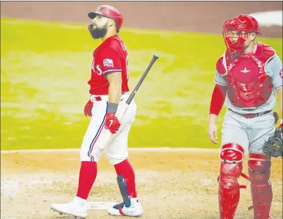  ?? Los Angeles Times/tns ?? Yuba City High product Max Stassi (right) reports to the Angels with a new deal on Feb. 16.