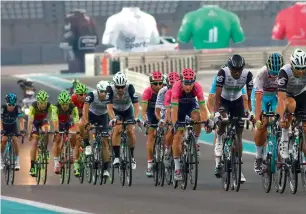  ?? AFP ?? Riders compete during the final stage of the Abu Dhabi Tour in Yas Marina Circuit on Sunday. —