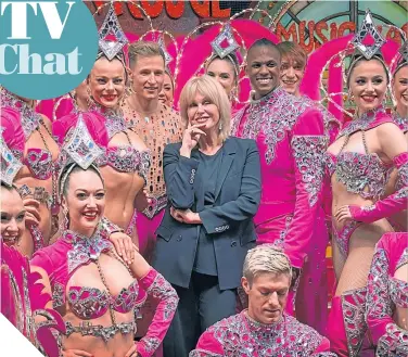  ?? ?? Dame Joanna Lumley with dancers from the world-famous Moulin Rouge in Paris