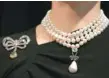  ??  ?? The ‘Queen Marie Antoinette’s Pearl’ with an estimated value of £767,500£1,534,000 GBP on Queen Marie Antoinette’s pearl and diamond necklace, together with diamond brooch during a photocall for the sale of ‘Royal Jewels at Sotheby’s auction house in London. – AFP