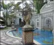  ?? JENNIFER KAY — THE ASSOCIATED PRESS ?? David Tamuty of Fort Lauderdale, Fla., lounges in the swimming pool at The Villa Casa Casuarina, a boutique hotel that once was the home of fashion designer Gianni Versace in Miami Beach, Fla. The new season of “American Crime Story” features the...