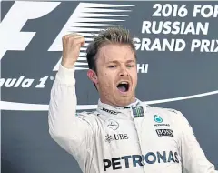  ?? AFP ?? Nico Rosberg celebrates on the podium in Sochi.