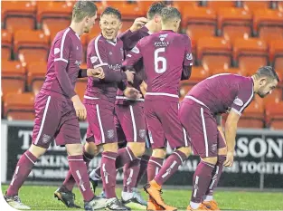  ??  ?? Ricky Little celebrates his goal with his Arbroath team-mates