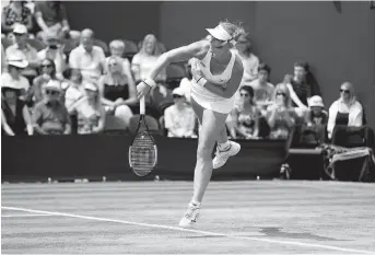  ??  ?? Kiki Bertens serves to Czech 7th seed Karolina Pliskova during their Wimbledon fourth-round match at the All England Club in London yesterday. The Dutchwoman won 6-3, 7-6 (2) to knock out the last remaining top-10 women’s seed. — Reuters