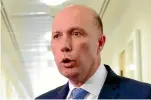  ?? AP ?? Pressure is mounting on Peter Dutton over decisions he made as immigratio­n minister in 2015.