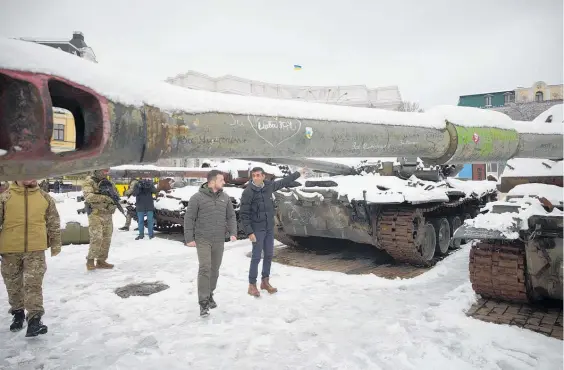 ?? Photo / AP ?? British Prime Minister Rishi Sunak promised 125 anti-aircraft guns and other air-defence technology as he made an unannounce­d visit yesterday — his first — to Ukraine’s snow-blanketed capital for talks with Ukrainian President Volodymyr Zelenskyy. The air-defence package, which Britain valued at £50 million, ($97m) comes as Russia has been pounding Ukraine’s power grid and other key infrastruc­ture from the air, causing widespread blackouts for millions of Ukrainians amid frigid weather. It comes on top of a delivery of more than 1000 anti-air missiles that Britain announced earlier this month. The UK has been one of the staunchest Western backers of Ukraine’s resistance to Russia’s invasion.