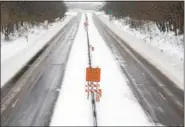  ?? TOM KELLY III — FOR DIGITAL FIRST MEDIA ?? Officials said most drivers stayed off the roads, which made plowing easier. Here, Route 422 in North Coventry remained partially snow covered without much traffic in the middle of the afternoon Tuesday.