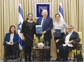  ?? (Haim Zach/GPO) ?? PRESIDENT REUVEN RIVLIN poses with (from right) Nechama Rivlin, Roni Rottler, Shira Ruderman and MK Karen Elharar at a meeting devoted to citizens with disabiliti­es, at the President’s Residence yesterday.