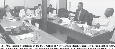  ?? (Dhanash Ramroop photo) ?? The PUC hearing yesterday at the PUC Office at New Garden Street, Queenstown. From left to right, PUC Chairman Dela Britton, Commission­er Maurice Solomon, PUC Secretary Vidiahar Persaud, GTT attorney Mark Reynolds and GTT CEO Justin Nedd