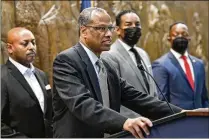  ?? HYOSUB SHIN/HYOSUB.SHIN@AJC.COM ?? Integral Group founder and chairman Egbert L.J. Perry speaks at a news conference in 2022 during which Mayor Andre Dickens announced the settlement agreement. The Integral Group will now move forward with developmen­t plans.