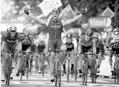  ?? CHRIS GRAYTHEN/GETTY ?? Germany’s Marcel Kittel crosses the line and celebrates his victory in Stage 2 of the Tour de France in Belgium.