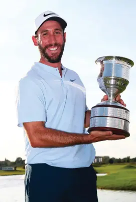  ?? GETTY IMAGES ?? Romain Wattel celebrates with the trophy after winning the KLM Open at The Dutch