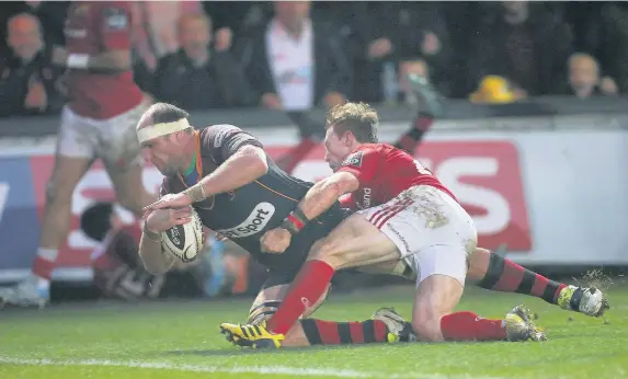  ??  ?? > Rynard Landman ploughs across for the only try of the game at Rodney Parade yesterday
PICTURE: Huw Evans Agency