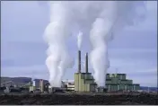  ?? RICK BOWMER — THE ASSOCIATED PRESS ?? Steam billows from a coal-fired power plant in Craig, Colo., Nov. 18, 2021.