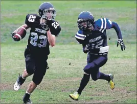  ?? JENNIFER VARDY LITTLE ?? Griffin Abbott charges up the field pursued by an Avon View player Oct. 23. Northeast Kings defeated the Windsor team 28-0 to claim sole possession of second place in the standing.