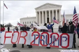  ?? PHOTOS BY JOSE LUIS MAGANA — THE ASSOCIATED PRESS FILE ?? Supporters of former President Donald Trump protest outside of the Supreme Court in Washington on Jan. 6, 2023.