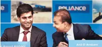  ??  ?? Reliance Group Chairman Anil Ambani (right) with son Jai Anmol Ambani at the Reliance Capital AGM in Mumbai on Tuesday