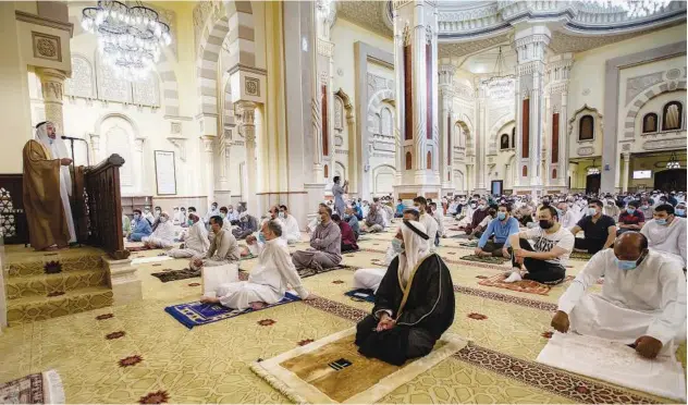  ?? Kamal Kassim/ Gulf Today ?? People attend the Friday congregati­on at the Al Noor Mosque in Sharjah.