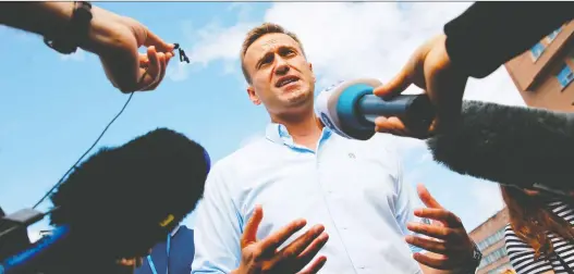 ?? MAXIM ZMEYEV/AFP VIA GETTY IMAGES FILES ?? Russian activist Alexei Navalny, seen here in July 2019, is still recovering in a German hospital after suffering symptoms suggestive of exposure to a nerve agent. The chemical attacks the process of neurotrans­mitters.