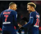  ?? Photo/Thibault Camus) (AP ?? PSG's Kylian Mbappe (left) reacts with PSG's Neymar, celebratin­g after he scored his side's second goal during the League One soccer match between Paris Saint-Germain and Lille at the Parc des Princes stadium in Paris, Friday, Nov. 2, 2018.