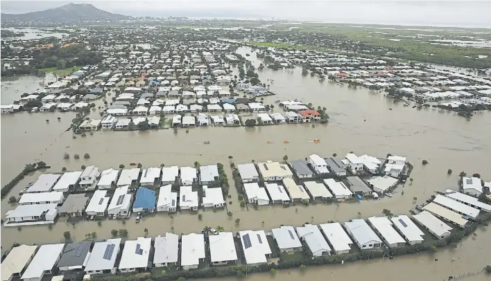  ?? EFE ?? Inundacion­es. Vista aérea de una zona residencia­l completame­nte inundada en Townsville, Australia, esta semana. Ese país tuvo el enero más caluroso de todos los tiempos.