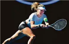  ?? AFP ?? Eugenie Bouchard of Canada hits a return during her win against Peng Shuai of China in the Australian Open yesterday.