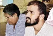  ??  ?? Ahmedabad blast prime accused Tausheek Ahmad with his associate Shahanshah Khan at Gaya Civil Line police station after his arrest by Bihar Anti-terrorism Squad (ATS), in Gaya on Thursday