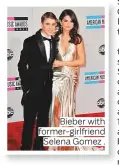  ??  ?? Bieber with former-girlfriend Selena Gomez .