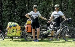  ?? PHOTOS: BRENT AND CLAIRE RURU ?? Wearing New Zealand-branded tops while cycling through Canada scored them multiple impromptu homestays.