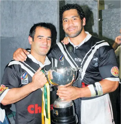  ?? Photo / Photosport ?? NRL Hall of Famers Ruben Wiki (right) and Stacey Jones after the Kiwis beat Australia in 2005.