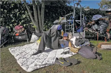  ?? Michael Macor / The Chronicle ?? A homeless man who calls himself Tree lives in an encampment at Berkeley’s Ohlone Park. New ordinances seek to discourage people from strewing bags on city sidewalks and urinating and defecating in city parks.