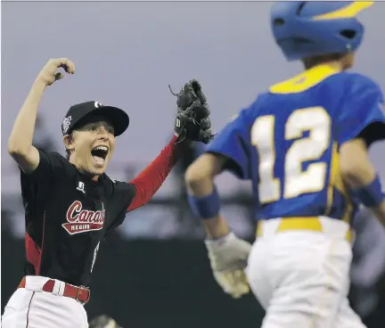  ?? MATT SLOCUM/THE ASSOCIATED PRESS FILES ?? East Nepean’s David Legault celebrates a 4-3 win at the Little League World Series tournament in 2013.