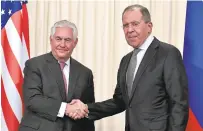  ?? ALEXANDER NEMENOV/AFP/GETTY IMAGES ?? Russian Foreign Minister Sergei Lavrov, right, met with Secretary of State Rex Tillerson on Wednesday.