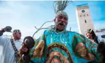  ??  ?? A Gnawa traditiona­l group performs in the city of Essaouira.