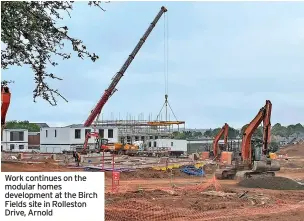  ?? ?? Work continues on the modular homes developmen­t at the Birch Fields site in Rolleston Drive, Arnold