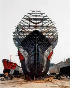  ?? ?? Burtynsky’s “Shipyard #11, Qili Port, Zhejiang Province, China” and “Silver Lake Operations #14, Lake Lefroy, Western Australia.”