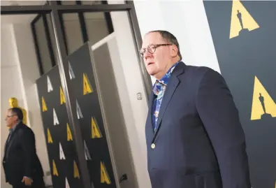  ?? Valerie Macon / AFP / Getty Images 2015 ?? John Lasseter, seen at the Oscars, was Pixar’s creative leader for decades. Now the studio needs a successor.