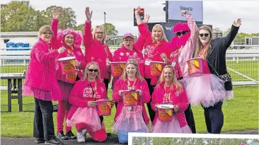  ?? ?? Fundraiser Anna Jellye (front centre) from Asda Perth, with fellow Asda community champions from all over Scotland, who helped fund raise for Breast Cancer Now, and inset, Ladies Day