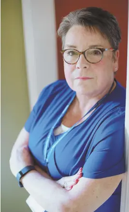  ?? STAFF PHOTO BY MATT WEST ?? ‘AFFECTS EVERYONE’: Nurse Karen Coughlin, who will testify in support of the bill today, said she’s ‘been spit at ... punched’ and kicked in the workplace.