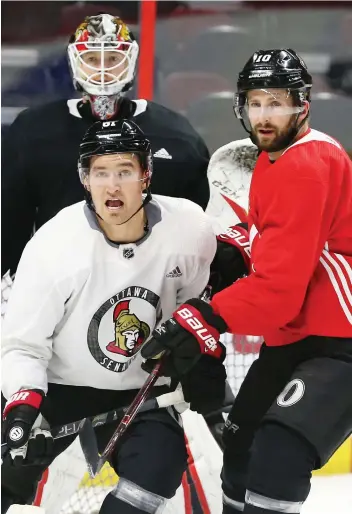  ?? JEAN LEVAC ?? Senators forward Mark Stone, left, battling teammate Tom Pyatt during practice Thursday at Canadian Tire Centre as goalie Mike Condon looks on, will be in the lineup Saturday when they host the Canadiens.