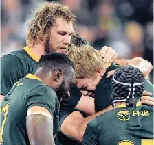  ?? | Reuters ?? South Africa’s Pieter-Steph du Toit cries tears of joy as he celebrates with teammates.