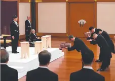  ?? Picture: AFP ?? Japan’s new Emperor Naruhito (top left) attends a ceremony to inherit the imperial regalia and seals at the Matsu-no-Ma state room inside the Imperial Palace in Tokyo.